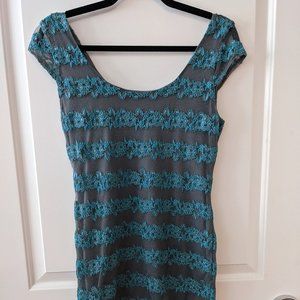 Lacey gray dress with teal blue accents
